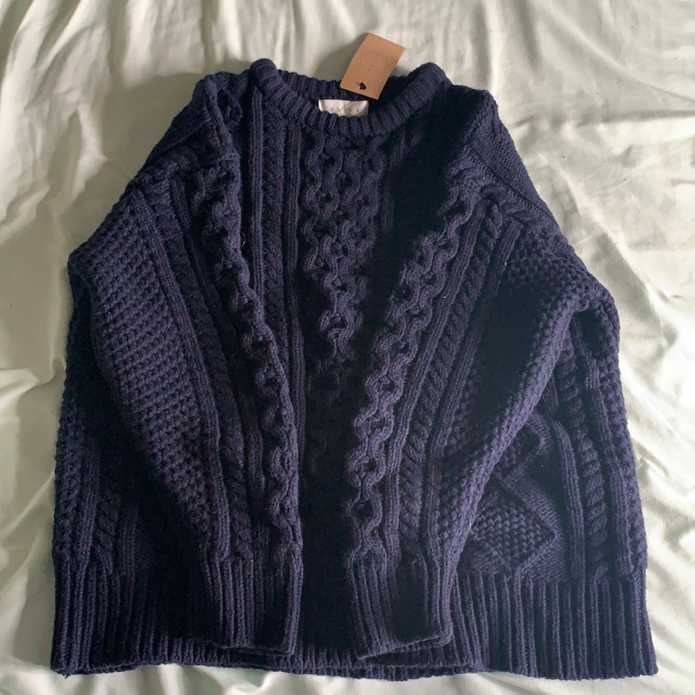 NWT navy knit sweater by the brand OLIVE